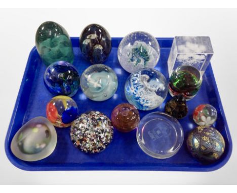 A collection of paperweights including Selkirk, Caithness, Isle of Wight, a Victorian green glass dump with sulphide inclusio