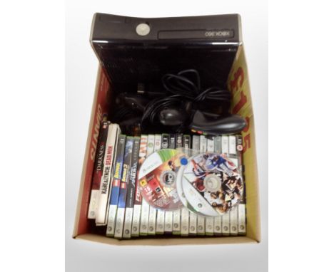An Xbox 360 console with controllers and assorted games.