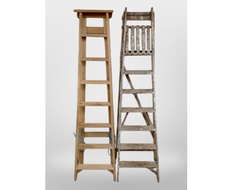 Two wooden step ladders 