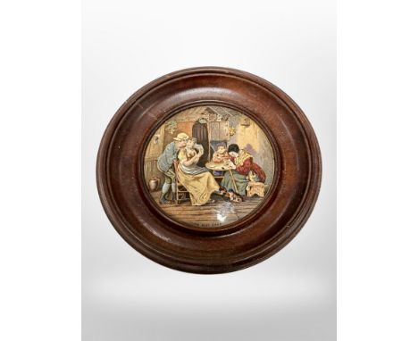 A Prattware pot lid in circular frame, diameter 16cm.