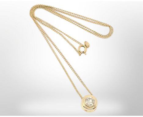 A solitaire diamond pendant, the brilliant cut stone set in 18ct gold weighing approximately 0.9 carat CONDITION REPORT: Chai