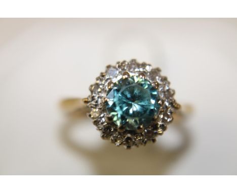 A 18ct gold diamond &amp; blue topaz cluster ring size M 1/2 