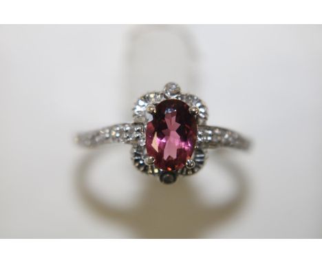 A 9ct gold &amp; diamond &amp; pink topaz ring size L 1/2 