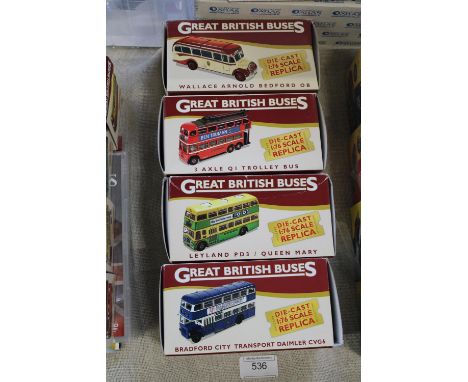 Four new boxed Atlas 1:76 scale model buses 