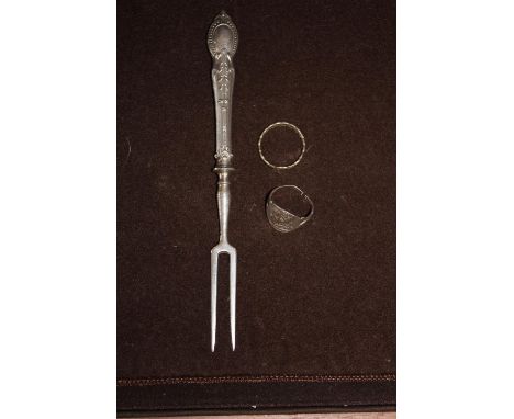 A silver handled toasting fork &amp; two other silver items 