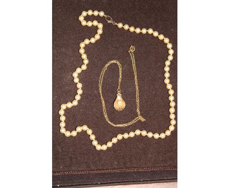 A 10ct gold pendant on a gold plated chain &amp; set of vintage cultured pearls 