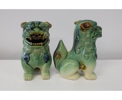 Two ceramic Chinese fou dog figures 