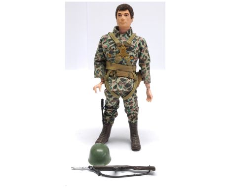 Palitoy Vintage Action Man Paratrooper, dark flock hair, hard hands, wearing camouflage uniform, back pack, carbine rifle, pl