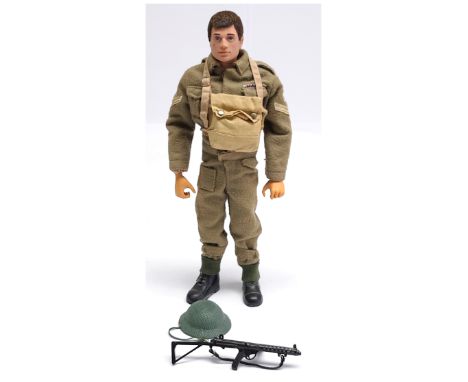 Palitoy Vintage Action Man British Infantryman, dark flock hair, gripping hands, wearing tunic and trousers, lace-up boots, e