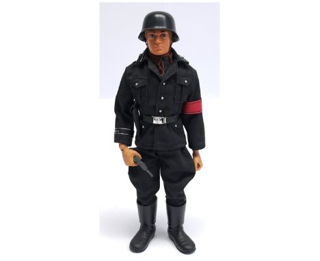 Palitoy Vintage Action Man figure, blonde flock hair, gripping hands, eagle eyes, dynamic body wearing a non-Palitoy German S