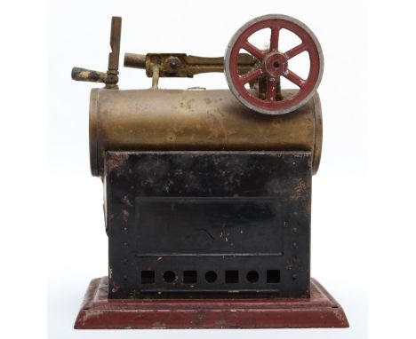 A unbranded German made steam engine, brass on tin base on a tin plinth 