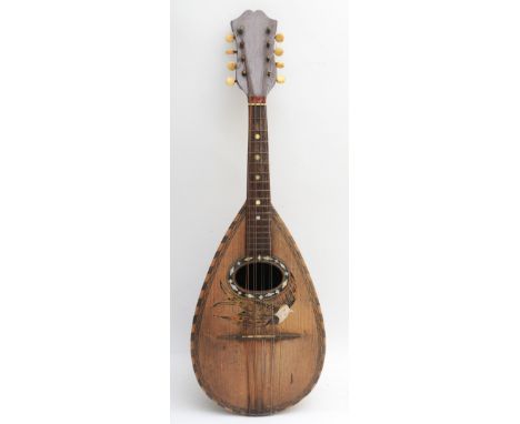 An early 20th century cased mandolin, maker F.DE. Mureda of Napoli Italy, having inlaid beading and mother of pearl decoratio