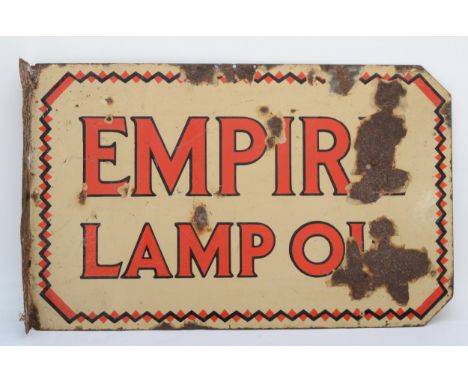 A double sided vitreous enamel wall sign 'Empire Lamp Oil' circa 1930s, 61x38cm.