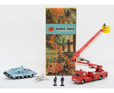 A boxed Corgi Major Toys -  Simon Snorkel Fire Engine. No.1127, with seven plastic Dinky firemen, a reproduction Captain Scar