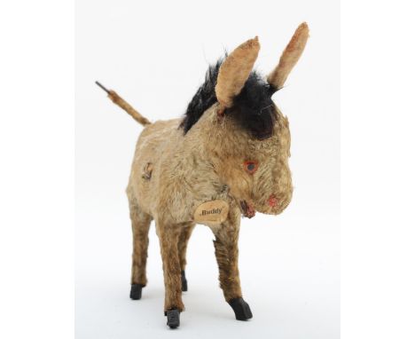 A small tinplate donkey called Buddy, with wagging ears, tail and tongue, 15 x 13 x 5cm 