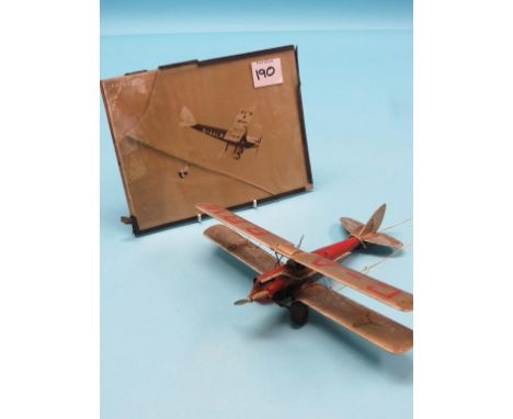 A 1930's scratch-built model bi-plane, G-ABBW, detailed with single-engine, exhaust and rigging, rubber tyres, wingspan 11in.