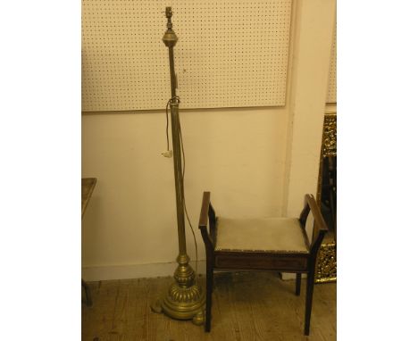 An Edwardian inlaid mahogany piano stool, with hinged, upholstered seat, and a brass floor lamp, on circular base