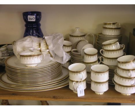 A Paragon bone china tea and coffee service, 86 pieces including coffee pot, Athena pattern, together with a blue-overlaid gl