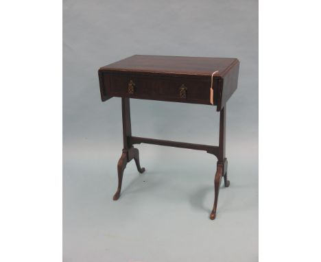 A small mahogany sofa table, flame-veneered top with drop-leaves, two frieze drawers, on four cabriole legs, 2ft.