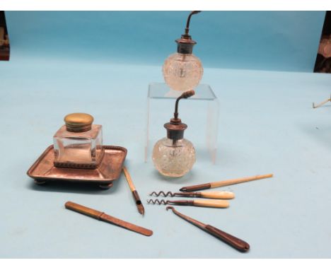 A pair of silver-mounted cut glass atomisers, square silver plated inkwell and six small implements 
