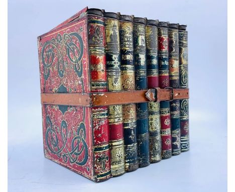 Vintage novelty biscuit tin in the form of a set of leather-bound books, novels by Sir Walter Scott, secured with a belt