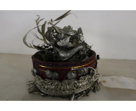 Unusual 19th/20th C Chinese wedding hat.  White metal bird nest detail and embossed panel to the front with hanging pendants 