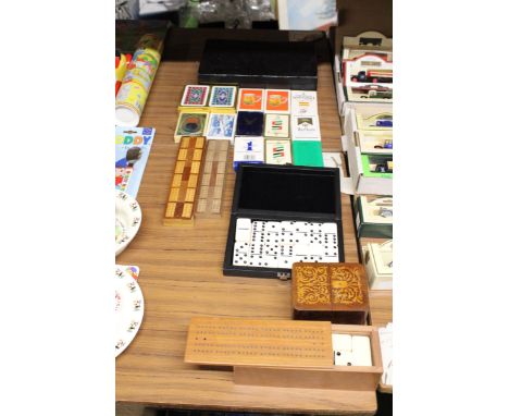 A MAH-JONG SET AS NEW IN CASE, DOMINO SETS TO INCLUDE WADDINGTON'S CLUB DOMINOES IN A WOODEN BOX WITH BUILT IN SCORECARD, TWO