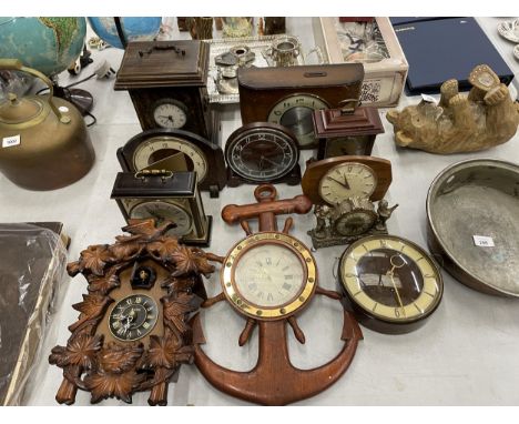 ELEVEN VARIOUS WALL AND MANTLE CLOCKS TO INCLUDE A CUCKOO CLOCK, METAMEC, ETC