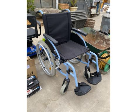 A SELF PROPELLED WHEELCHAIR