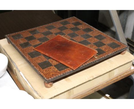 A HEAVY RESIN CHESSBOARD