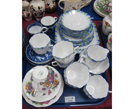 Melba early XX Century ribbed tea service of twenty one pieces painted surrounds in blue and green, Coalport old willow etc. 