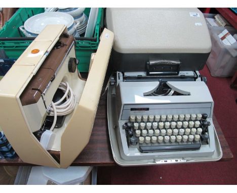 Frister and Rossmann Cub 4 Sewing Machine; together with an Adler Gabriele 25 typewriter, (2)