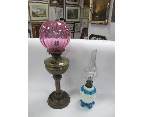 XIX Century Brass Oil Lamp, with a glass funnel, and glass shade on a circular base, together with one other XIX Century milk