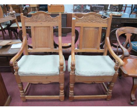 Pair of Keenpine throne style chairs each with shell and scroll pokerwork carved cresting, rectangular panel back, turned and