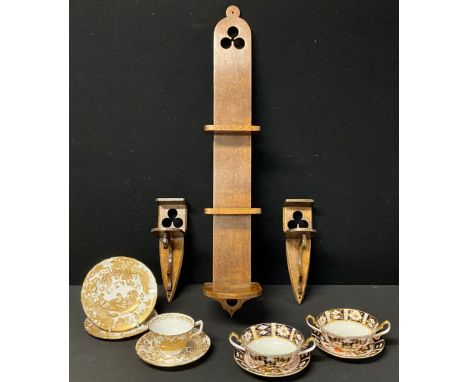 Royal Crown Derby - Golden Avesbury pattern trio and side plate, pair of 2451 pattern soup bowls and stands, all seconds with