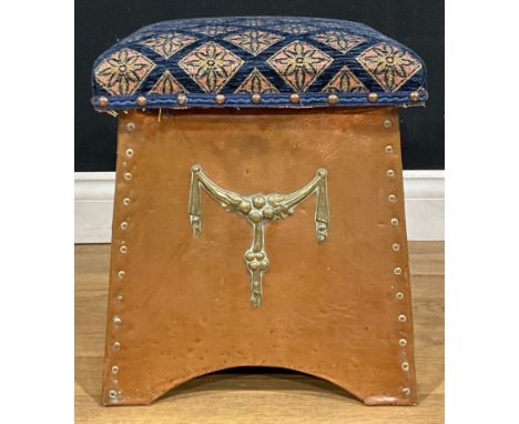 An Arts and Crafts period planished copper coal or log bin, upholstered stool top, c.1920