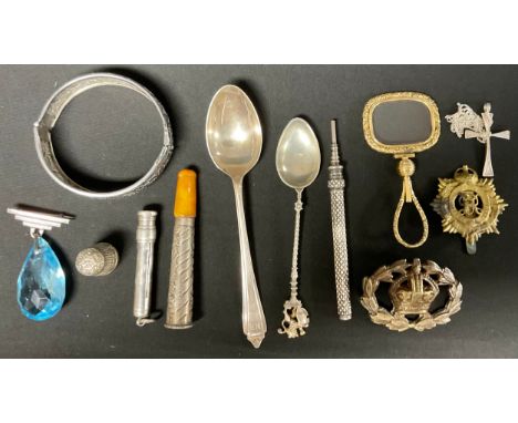 A 19th century gilt metal mounted Quizzing or magnification suspension glass pendant;  silver mounted cheroot holder silver s