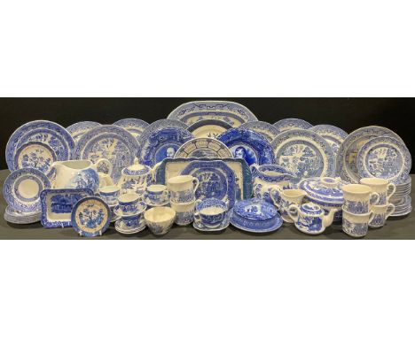 A collection of blue and white tableware, including meat plate, dinner plates, tureens, teapot, jugs, butter dish, child's te