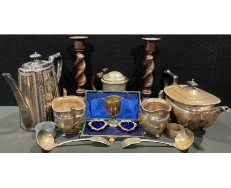 A silver trophy cup, silver plated three piece tea set, Victorian coffee pot etc;  pair of Oak barley twist candlesticks etc