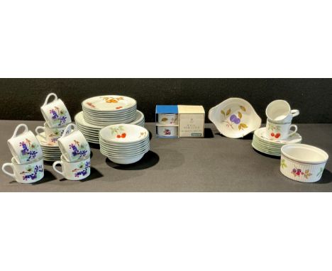 A Royal Worcester Evesham Vale dinner service and tea service for eight, comprising dinner plates, dessert plates, dessert bo