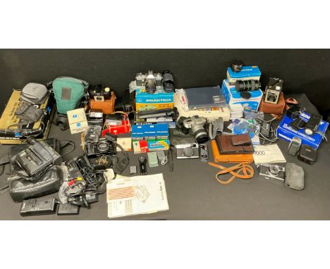 Cameras &amp; Photographic Equipment- Minolta 404Si 35mm slr camera body, 28.80mm lens;  others Olympus Trip, Kodak six-20 C,