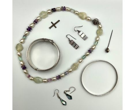 A Selection of Silver Jewellery;to include a vintage silver scroll decorated half hinged bangle and another bangle, a culture