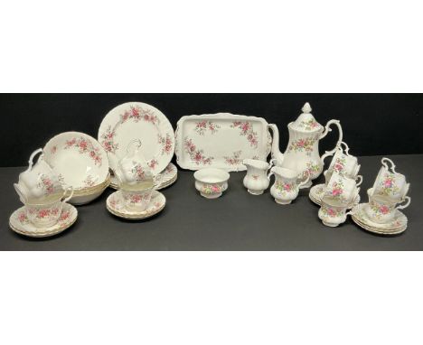 A Royal Albert Moss Rose pattern coffee set for six, including coffee pot; a Royal Albert Lavender Rose pattern sandwich tray