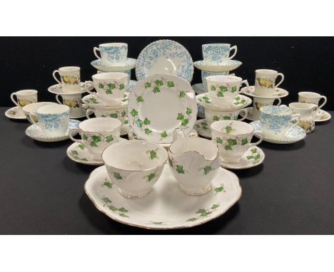 A Colclough/Ridgeway 21 piece tea set; others, a Royal Doulton coffee set, 12 piece; a 27 piece blue floral tea set (qty)