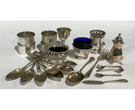 A George V silver napkin ring, Sheffield 1929; five other silver napkin rings, assorted; an Elizabeth II  silver pepper pot a
