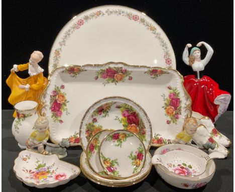 A Wade Mabel Lucie Attwell figure "Sam" walking his terrier, 8cm; another a/f; a Royal Doulton figure, Karen HN4779; another,