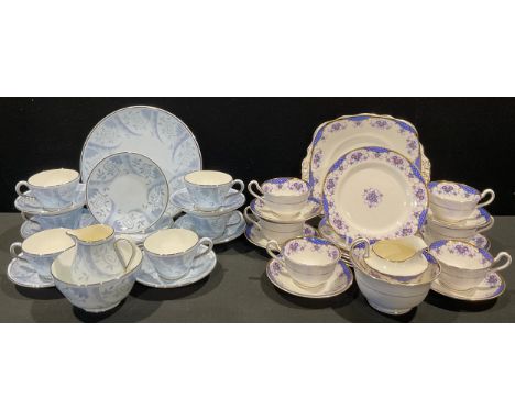 A Wedgwood Winter Morn pattern tea set for six; a Clifton tea set for six, picked out with gilt