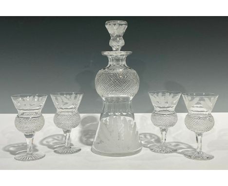 An Edinburgh cut glass crystal thistle shaped decanter, conforming drop-in stopper, 28cm, engraved mark; a suite of four acco