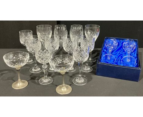 A pair of Royal Doulton wine glasses; a pair of Rockingham Crystal wine glasses; a pair of Stuart Crystal wine glasses, boxed