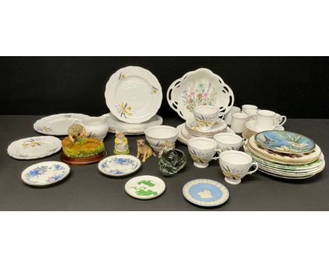A pair of Royal Albert Moonlight Rose pattern pin trays; a Royal Doulton Brambly Hedge model, Primrose Woodmouse; a Border Fi